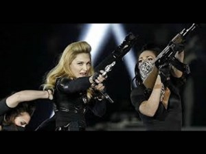 Madonna , Pepsi Center , Gang Bang , James Holmes , Batman